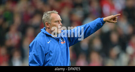 Freiburg, Germany. 06th Oct, 2013. Freiburg's head coach Christian Streich reacts during the German Bundesliga soccer match between SC Freiburg and Eintracht Frankfurt at Mage Solar Stadium in Freiburg, Germany, 06 October 2013. Photo: PATRICK SEEGER/dpa/Alamy Live News Stock Photo