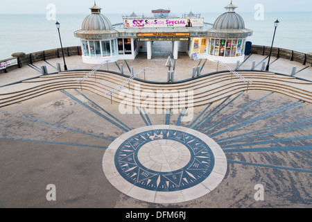 Cromer Pier Norfolk UK at dusk with signs and lights Stock Photo