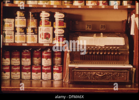 OLD STYLE CASH REGISTER AND CANNED GOODS IN A BUTCHER SHOP IN NEW ULM, MINNESOTA. THE TOWN IS A COUNTY SEAT TRADING... 558255 Stock Photo