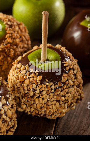 Homemade Caramel Taffy Apple with Peanuts for Halloween Stock Photo
