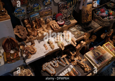 Religious iconography souvenirs display at the souk of the Christian quarter old city East Jerusalem Israel Stock Photo