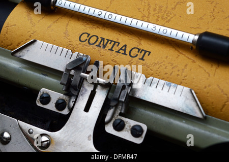 Contact text on typewriter Stock Photo