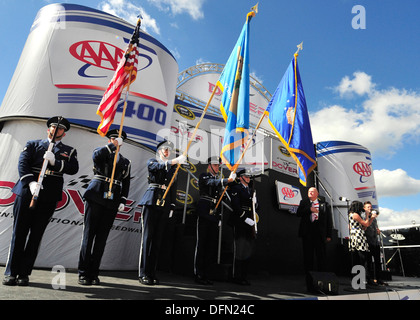 Members of the Team Dover honor guard present the colors during the national anthem before the start of the AAA 400 Sept. 29, 2013, at Dover International Speedway in Dover, Del. Members of Team Dover participated in a variety of activities in support of Stock Photo