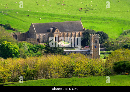 Abbotsbury tithe barn and church. Dorset, UK Stock Photo