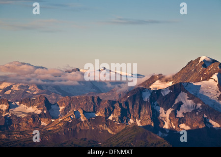 Early morning cloud in the peaks of the Bugaboos, B.C. Canada Stock Photo