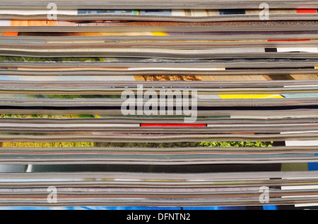 Stack of old colored magazines close-up. Stock Photo