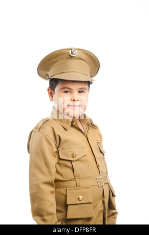 Close-up of a boy dressed as a police uniform smiling Stock Photo