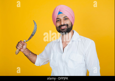 Happy Indian farmer Holding sickle and Paddy crop in hand - Concept ...