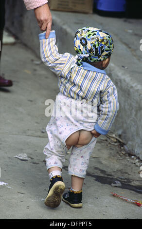 Chinese child wearing slit pants with no nappy Stock Photo - Alamy