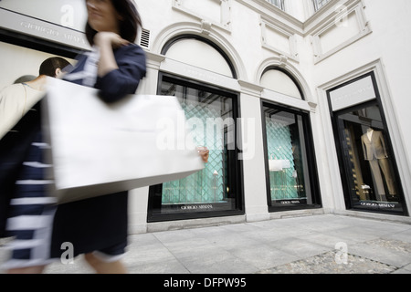 Italy, Lombardy, Milan, Golden Triangle, Fashion Shops, Via Montenapoleone, Woman Shopping, Giorgio Armani, Stock Photo