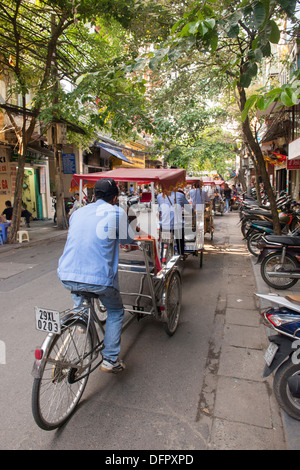 riding cyclos in Hanoi, Vietnam Stock Photo