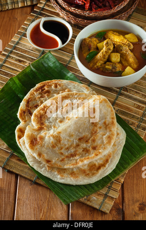 Roti canai and Straits chicken curry Malaysia Food Stock Photo