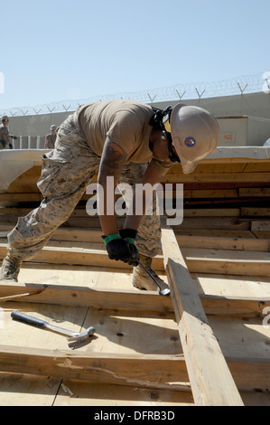 Kandahar Airfield, Afghanistan - US Navy Builder Constructionman Sparkle Campbell attached to Naval Mobile Construction Battalion (NMCB) 28, works on a demolition project, Oct. 2, 2013. NMCB 28 is based out of Barksdale Air Force Base, Shreveport, La., an Stock Photo