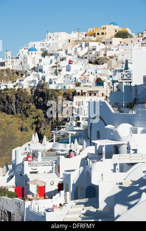 SANTORINI (THIRA), CYCLADES, GREECE. A view of the picturesque, whitewashed cliff-top village of Imerovighli near Fira. Stock Photo