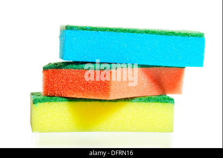 a stack of colorful sponges for ware on a white background Stock Photo