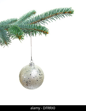 Christmas ball hanging on a fir branch isolated on white background Stock Photo