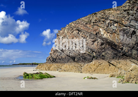 Striated multicoloured rock formation on cliff on beach at Balnakeil Bay, Durness, Sutherland, Northwest Highlands Scotland UK Stock Photo