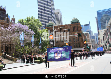 Sydney, Australia. 9th October 2013. The crew from HMAS Australia marches past Sydney Town Hall and the Reviewing Officer Her Excellency the Honourable Quentin Bryce AC CVO, Governor-General of the Commonwealth of Australia (yellow). Copyright Credit:  2013 Richard Milnes. Alamy Live News. Stock Photo