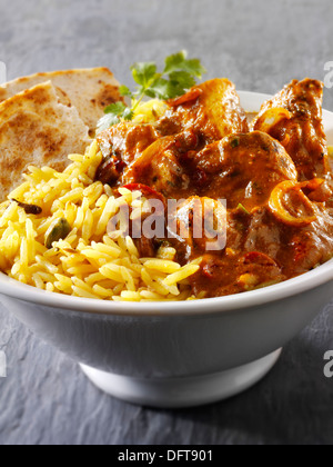 Balti Chicken Indian Curry and pilau rice Stock Photo
