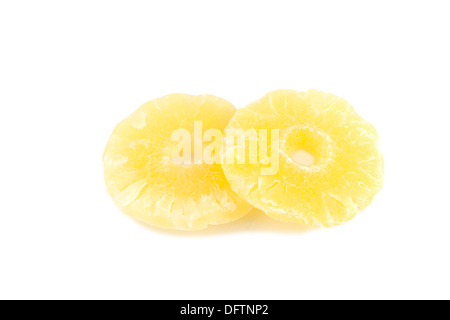 Dried pineapple rings on a white background Stock Photo