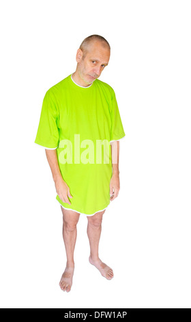 A depressed man in green nightdress, on white background Stock Photo