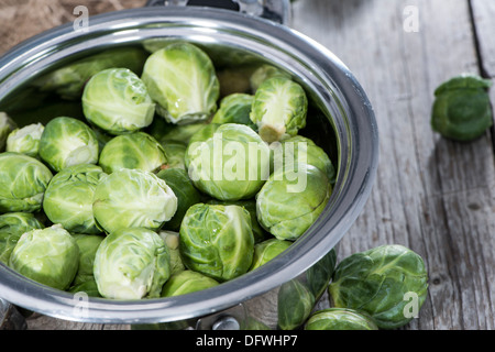 Raw Brussel Sprouts in a pot Stock Photo