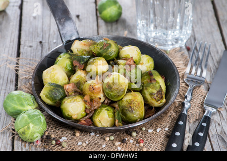 Brussel Sprouts with Ham in a pan Stock Photo