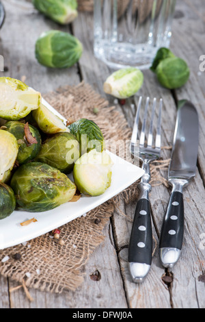 Portion of fried Brussel Sprouts with Ham and Onions Stock Photo