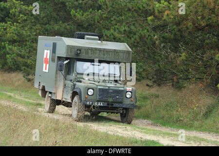 Land Rover Defender 130 battlefield ambulance on a dirt track on Salisbury Plain Training Area. Stock Photo