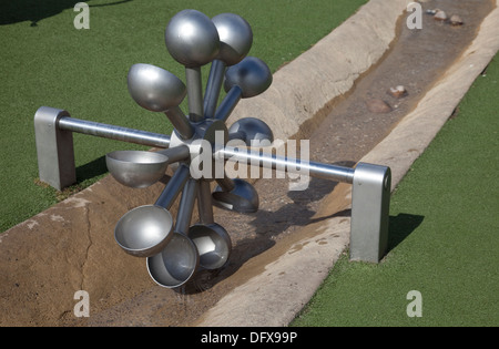 Model of Pelton wheel impluse turbine which generates electricity from moving water Slimbridge UK Stock Photo