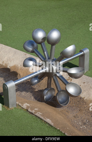 Model of Pelton wheel impluse turbine which generates electricity from moving water Slimbridge UK Stock Photo