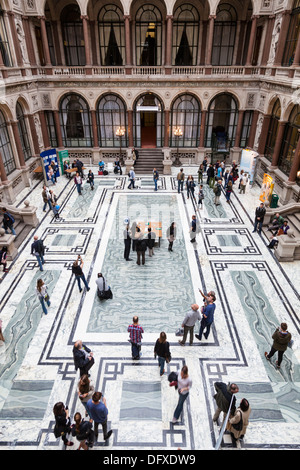 Visitors walk around the Durbar Court designed by Matthew Digby Wyatt within the Foreign and Commonwealth Office, Whitehall.