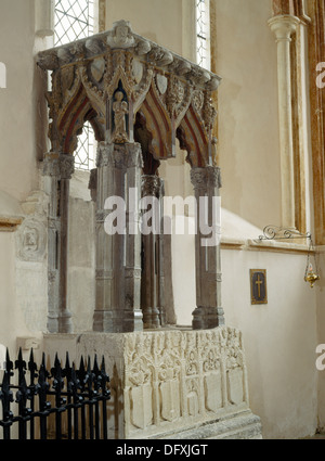 Purbeck marble shrine base c. 1320 of St Edburg(a) of Bicester (d. c. 650) standing on an altar tomb in Stanton Harcourt church, Oxfordshire. Stock Photo