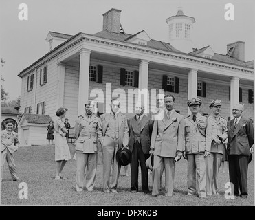 Prince Abdul Ilah of Iraq and representatives of the governments of the United States and Iraq, standing in front of... 199085 Stock Photo