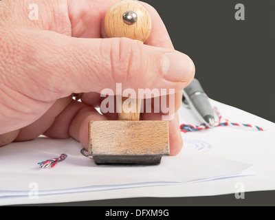 notary public in office verify documents Stock Photo