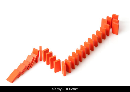 Ascending line graph formed by dominos Stock Photo