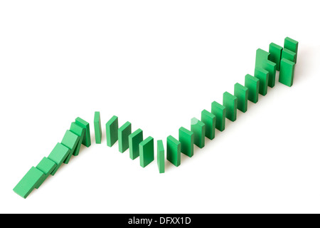 Ascending line graph formed by dominos Stock Photo