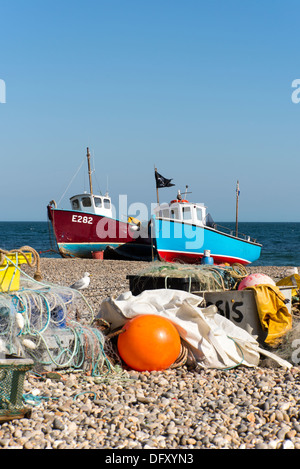 Fishing boats on the beach at Beer, Devon, England, UK. Stock Photo