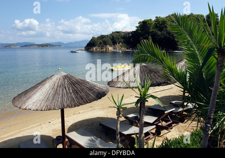 Sun Loungers on Kanapitsa Beach on the Greek Island of Skiathos, A popular tourist destination in the Aegean Sea. Stock Photo