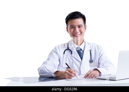 Happy male doctor at work Stock Photo