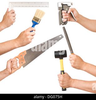 Various tools in a man's hand. Stock Photo