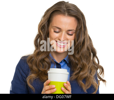 Smiling business woman with cup of hot beverage Stock Photo
