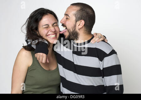 Young newlywed husband liking her wife on the cheek Stock Photo ... photo