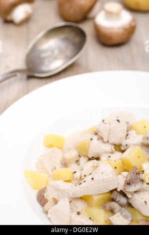 Blanquette from turkey with potatoes in a white plate Stock Photo