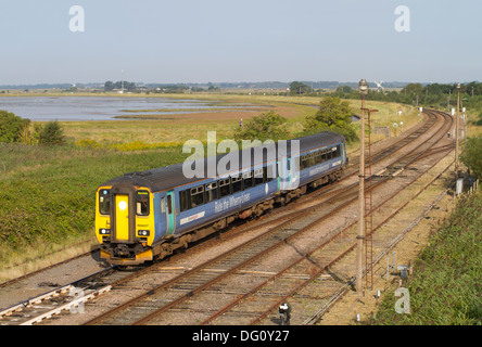 A Class 156 diesel multiple unit number 156407 working a Wherry Lines Greater Anglia service approaching Great Yarmouth. Stock Photo