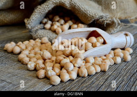 dried white chickpeas ceci on sack close up Stock Photo