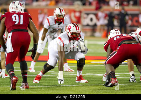 Louisville, KY, USA. 10th Oct, 2013. October 10, 2013: RT (66) at the line of scrimmage during the NCAA football game between the Rutgers Scarlet Knights and the Louisville Cardinals at Papa John's Stadium in Louisville, KY. Louisville defeated Rutgers 24-10. Credit:  csm/Alamy Live News Stock Photo