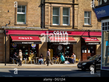 Branch of Costa high street coffee shop cafe chain in Matlock Derbyshire England UK with tables and chairs on pavement outside Stock Photo
