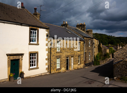 Traditional cottages in Eyam known as the plague village Derbyshire Peak District England UK Stock Photo