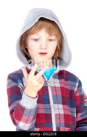 boy with blond hair counting on fingers of his hand - isolated on white Stock Photo